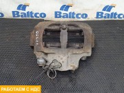 Суппорт тормозной левый